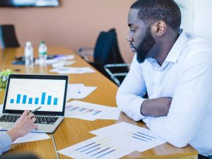 businessman-with-graph-laptop