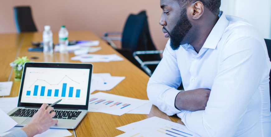 businessman-with-graph-laptop