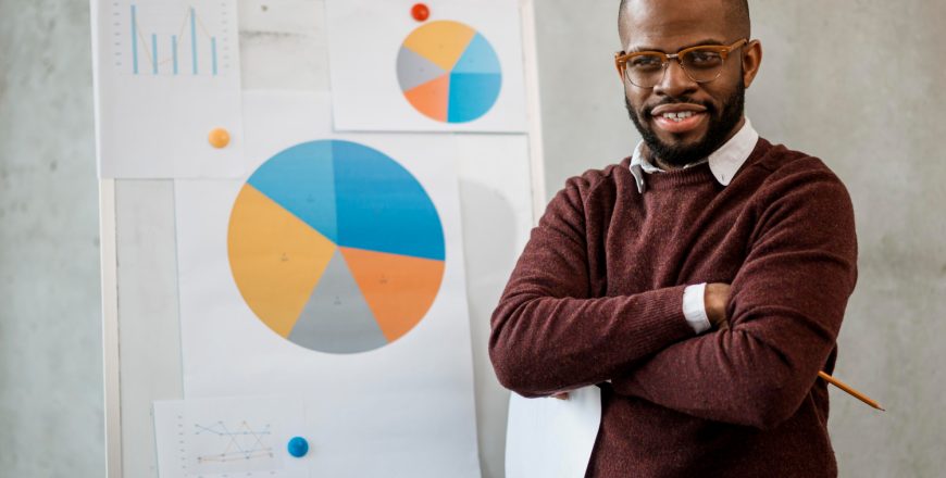 front-view-smiley-man-doing-presentation-during-meeting